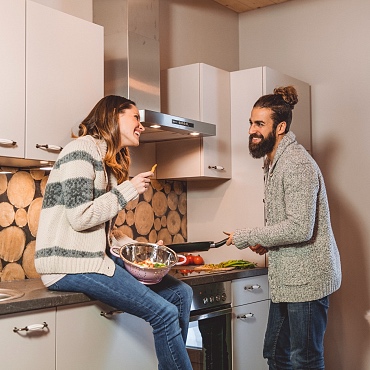 Gemeinsames Kochen in den kuschligen Chalets in Alpegg, Waidring